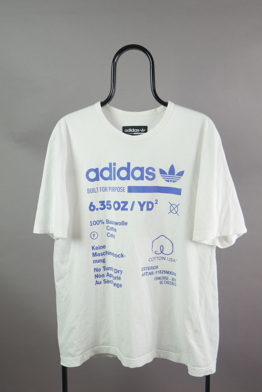 The Adidas Care Label Graphic T-Shirt (L)