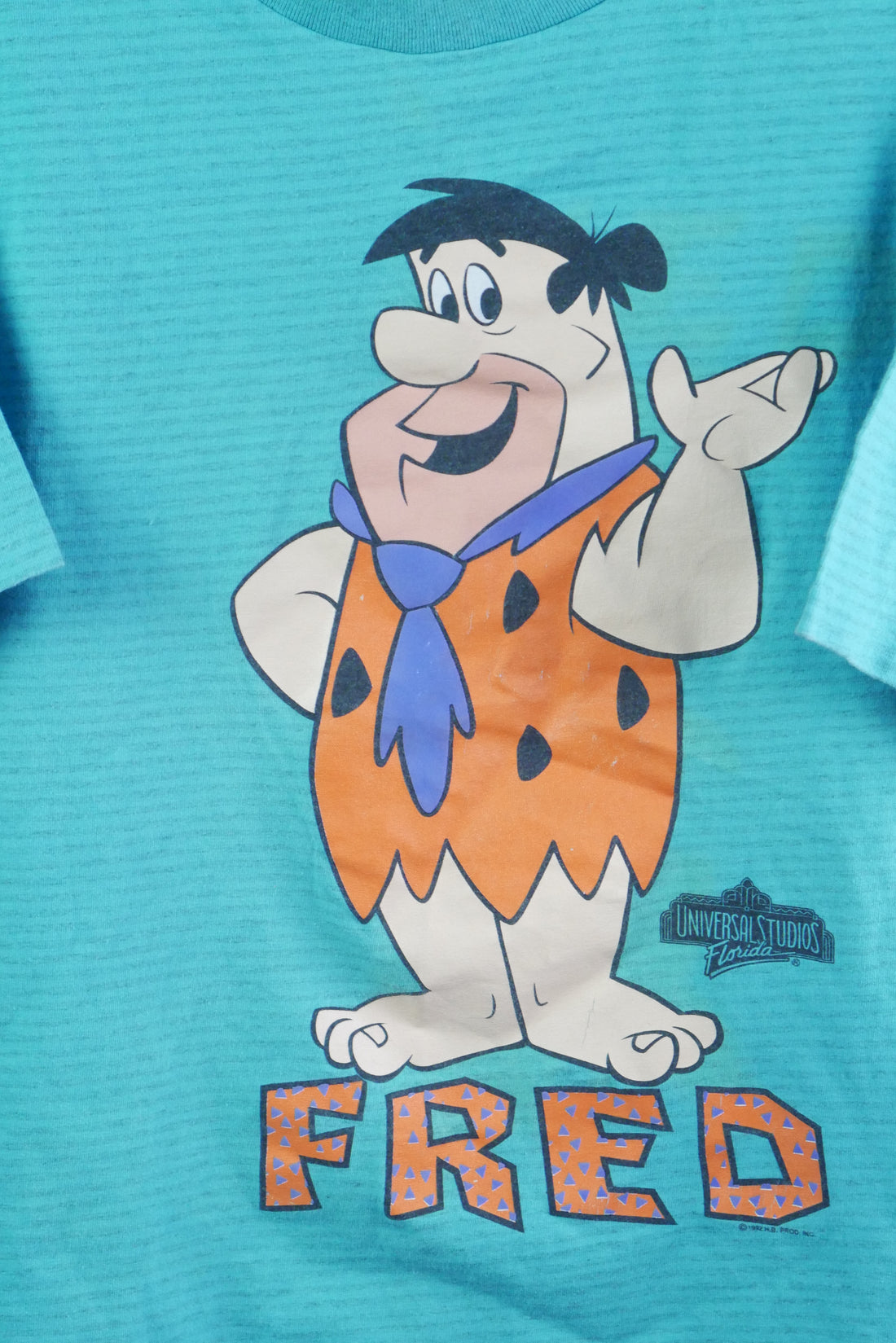 The Vintage Fred Flintstone Graphic Striped T-Shirt (L/XL)